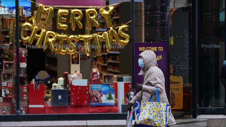 Christmas shoppers on Buchanan Street in Glasgow after Boris Johnson urged people to come forward to get a Covid booster jab, as the latest data suggests the Omicron variant of the virus may be milder than others. Picture date: Friday December 24, 2021.
