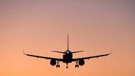 A passenger aircraft descends to land at Heathrow Airport, as British Prime Minister Boris Johnson announced a relaxing of COVID-19 travel testing rules for entering and leaving England amidst the continuation of the coronavirus disease (COVID-19) pandemic in London, Britain, January 5, 2022. REUTERS/Toby Melville
