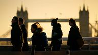 Commuters on London Bridge make their way into offices during the morning rush hour after advice to work from home was dropped on Wednesday by Prime Minister Boris Johnson. Picture date: Thursday January 20, 2022.
