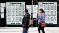 People walk past a recruitment shop, as the outbreak of the coronavirus disease (COVID-19) continues, in Luton, Britain August 6, 2020. REUTERS/Paul Childs