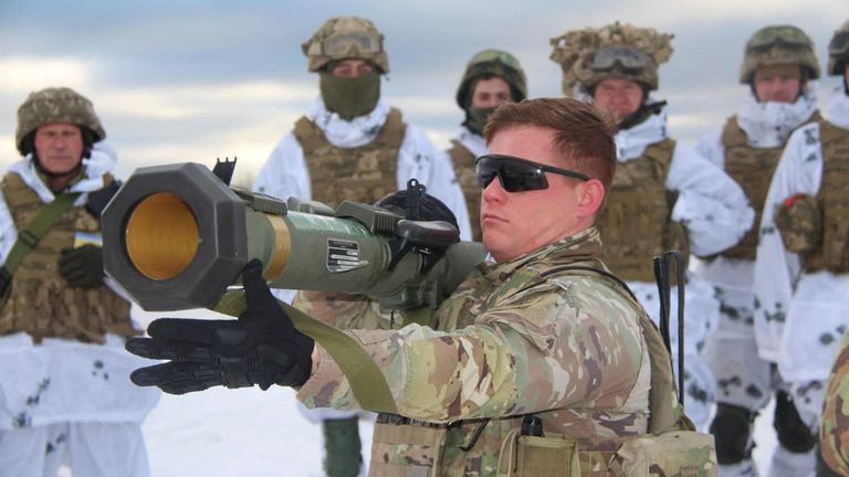 U.S. army instructors trains Ukrainian service members to operate with M141 Bunker Defeat Munition (SMAW-D) grenade launcher at a shooting range in Lviv region