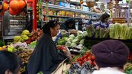 People shop at a supermarket amid the coronavirus disease (COVID-19) outbreak, in London, Britain December 24, 2021. REUTERS/Kevin Coombs
