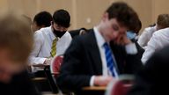 Pupils at The Fulham Boys School take a mock exam on the first day after the Christmas holidays following a government announcement that face masks are to be worn in English secondary schools amid the coronavirus disease (COVID-19) outbreak in London, Britain, January 4, 2022. REUTERS/Kevin Coombs
