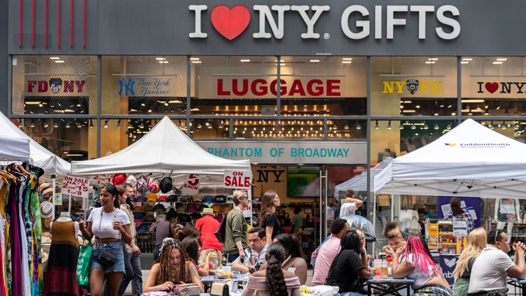 People shop at a street fair near Times Square in New York City, U.S., July 11, 2021