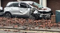 Handout photo taken with permission from the Twitter feed of @cobbyqpr showing damage to a car caused by falling bricks from a tower block during Storm Eunice. A rare red weather warning - the highest alert, meaning a high impact is very likely - has been issued by the Met Office due to the combination of high tides, strong winds and storm surge. Picture date: Friday February 18, 2022.
