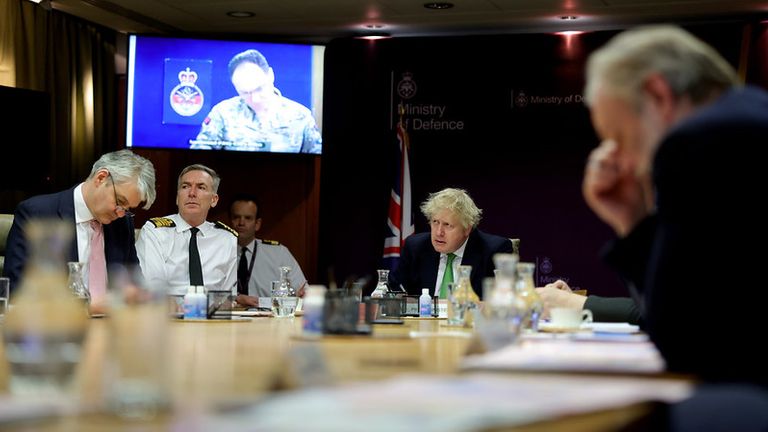 DOCS NOT BLURRED 22/02/2022. London, United Kingdom. Prime Minister Boris Johnson- Russia and Ukraine Situation. The Prime Minister Boris Johnson is briefed by the Chief of the Defence Staff Admiral Sir Tony Radakin at the Ministry of Defence on the situation in Ukraine. Picture by Andrew Parsons / No 10 Downing Street

