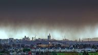 Glasgow, Scotland, UK 17th February, 2022. UK Weather: Rain returned with high winds as as  the beginnings of Storm Dudley and Storm Eunice sweep in over the city as shower curtains are visible ominously hanging over the west end and the Gothic skyline . Credit Gerard Ferry/Alamy Live News
