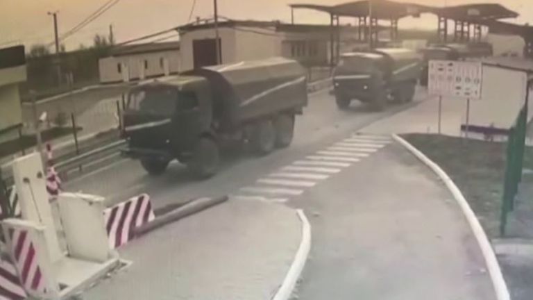 Russian military vehicles seen rolling across Ukraine's border at Crimean peninsula