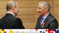 Russian President Vladimir Putin shakes hands with Vice President of the Judo Federation of Russia Boris Rotenberg after awarding him with the Order of Alexander Nevsky during a meeting at the Turbostroitel judo club in Saint Petersburg, Russia November 27, 2019. Sputnik/Mikhail Klimentyev/Kremlin via REUTERS ATTENTION EDITORS - THIS IMAGE WAS PROVIDED BY A THIRD PARTY.
