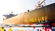 Activists of the environmental organization Greenpeace paint the words 'Oil fuels war' on the hull of a ship carrying Russian oil near the German island Fehmarn, Germany, Wednesday, March 23, 2022. (Frank Molter/dpa via AP)
AP