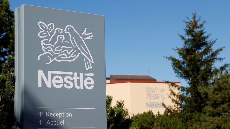 FILE PHOTO: A logo is pictured on the Nestle research center at Vers-chez-les-Blanc in Lausanne, Switzerland August 20, 2020. REUTERS/Denis Balibouse/File Photo