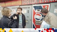 Thirsty Muscovites gather at a Pepsi Cola machine in Moscow, Friday, Sept. 6, 1991. The soda sells for 20 kopeks, about 10 cents a serving. (AP Photo/Peter Dejong)