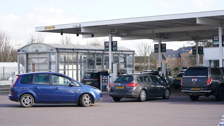 Drivers queue for fuel at a Sainsbury's fuel station in Biggleswade, Bedfordshire. Drivers and businesses have been hit by a record daily increase in diesel prices. Figures from data firm Experian Catalist show the average cost of a litre of the fuel at UK forecourts reached 165.2p on Tuesday, up nearly 3p on Monday's 162.3p. Picture date: Wednesday March 9, 2022.