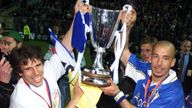 Chelsea's Gianfranco Zola (L) and player manager Gianluca Vialli celebrate with the European Cup Winners' Cup trophy after their victory [over VFB Stuttgart] in Stockholm May 13. [Chelsea won the game 1-0 when Gianfranco Zola scored after coming on as substitute in the second half. ] ??»
