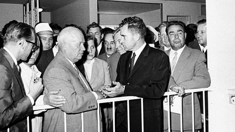 U.S. Vice President Richard Nixon, center, and Soviet Premier Nikita Khrushchev, left center, are engaged in a discussion as they stand in front of a kitchen display at the United States exhibit at Moscow's Sokolniki Park, July 24, 1959. Pic: AP