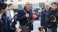 Members of the media follow Pierin Vincenz, former CEO of Swiss Raiffeisen bank and his lawyer Lorenz Erni after a trial in Zurich, Switzerland April 13, 2022. REUTERS/Arnd Wiegmann
