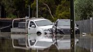 Vehicles partly submerged in Londonderry on the outskirts of Sydney. Pic: AP