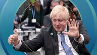 Britain's Prime Minister Boris Johnson indicates 1.5 degrees with his hands as he attends the World Leaders' Summit 