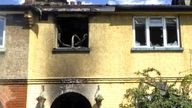 A home in New Malden, London, which suffered 'significant damage' in a fire after a man burned timber on an open fire in his living room to heat his home