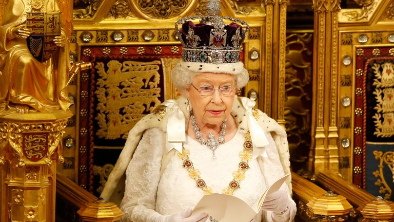 Britain's Queen Elizabeth II reads the Queen's Speech from the throne during the State Opening of Parliament in the House of Lords in London, Wednesday, May, 18, 2016. Queen Elizabeth II is marking her 96th birthday privately on Thursday, April 21, 2022 retreating to the Sandringham estate in eastern England that has offered the monarch and her late husband, Prince Philip, a refuge from the affairs of state. (AP Photo/Alastair Grant, File)