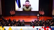 Ukrainian Ambassador to the U.S. Oksana Markarova receives applause as U.S. House Speaker Nancy Pelosi speaks and Ukrainian President Volodymyr Zelenskiy looks on through video, at the U.S. Capitol in Washington, U.S., March 16, 2022. J. Scott Applewhite/Pool via REUTERS