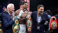 Anthony Joshua with Eddie Hearn (right) and Barry Hearn (2nd left) 