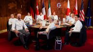 European Council President Charles Michel, European Commission President Ursula von der Leyen, Japanese Prime Minister Fumio Kishida, British Prime Minister Boris Johnson, U.S. President Joe Biden, German Chancellor Olaf Scholz, French President Emmanuel Macron, Canadian Prime Minister Justin Trudeau and Italian Prime Minister Mario Draghi attend a working dinner during the first day of the G7 leaders' summit at Bavaria's Schloss Elmau castle, near Garmisch-Partenkirchen, Germany, June 26, 2022.