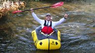 WILLIAM LAILEY / CATERS NEWS (PICTURED- George on his journey to work as he kayaks through the beautiful welsh streams) That's one way to beat rail strikes and rising fuel prices! Fed up commuter George Bullard has found a novel way to get to work - by kayaking down the river. Explorer George Bullard paddles to work on an inflatable kayak. George, 33, doesn't have to worry about the rising fuel costs or train strikes, knowing he will always be able to get to work. George explains: 