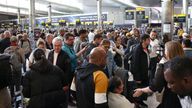 Passengers queue inside the departures terminal of Terminal 2 at Heathrow Airport in London, Britain, June 27, 2022. REUTERS/Henry Nicholls
