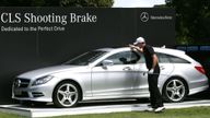 Stuart Manley of Wales pats a Mercedes Benz car making a hole-in-one on the 3rd tee during day three of the World Cup of Golf at Royal Melbourne Golf Course on November 23, 2013 in Melbourne, Australia