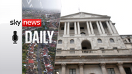 FILE PHOTO: The Bank of England (BoE) building is reflected in a sign, after the BoE became the first major world's central bank to raise rates since the coronavirus disease (COVID-19) 