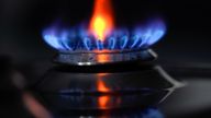 03/02/22 of a gas hob burning on a stove in a kitchen in Basingstoke, Hampshire. 