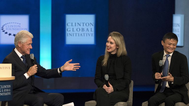 Former U.S. President Bill Clinton speaks with Jack Ma, executive chairman of Alibaba Group, and Elizabeth Holmes, CEO of Theranos, during the Clinton Global Initiative's annual meeting in New York
