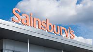 Edinburgh, UK - September 8, 2011: A large entance sign for a Sainsbury's supermarket in Craigleith, Edinburgh.  Sainsbury's are a British owned supermarket chain...Sainsbury's branding above the entrance to a large supermarket in Edinburgh, Scotland.