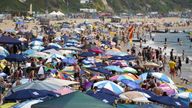 People on the beach in Bournemouth. Britons are set to melt on the hottest UK day on record as temperatures are predicted to hit 40C. Picture date: Tuesday July 19, 2022.
