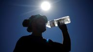 A worker drinks water on a road site in Aigrefeuille-sur-Maine
A worker drinks water on a road site in Aigrefeuille-sur-Maine near Nantes, as a heatwave hits France, July 12, 2022. REUTERS/Stephane Mahe