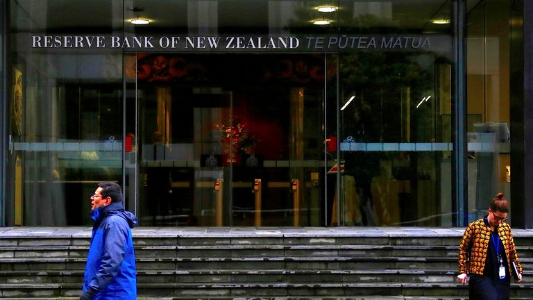 Pedestrians walk near the main entrance to the Reserve Bank of New Zealand located in central Wellington, New Zealand, July 3, 2017. Picture taken July 3, 2017. REUTERS/David Gray