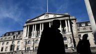 FILE PHOTO: Pedestrians walk past the Bank of England in London March 5, 2015. REUTERS/Suzanne Plunkett/File Photo