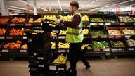 FILE PHOTO: A employee arranges produce inside a Sainsbury’s supermarket in Richmond, west London, Britain, June 27, 2022. Picture taken June 27, 2022. REUTERS/Henry Nicholls/File Photo
