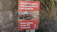 A group of people buried the hot foil in the sand. Pic: Swansea Council