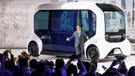 FILE PHOTO: Tokyo Motor Show 2019
FILE PHOTO: Toyota Motor Corporation President Akio Toyoda, shows the e-Palette autonomous concept vehicle at the Tokyo Motor Show, in Tokyo, Japan October 23, 2019. REUTERS/Edgar Su/File Photo