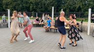 People dance in Victory Park, built by Avtovaz