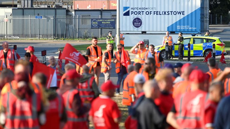 Strikers protest near an entrance to the UK's biggest container port Felixstowe, as workers continue an 8-day strike, in Felixstowe, Britain, August 22, 2022. REUTERS/Toby Melville
