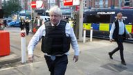 Prime Minister Boris Johnson leaves the area following a drugs related raid by Metropolitan Police officers, in West Norwood, London, as he undertakes visits to meet police recruits and speak to officers working in one of the 20 Violence Reduction Units. Picture date: Wednesday August 31, 2022.

