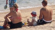 Holidaymakers on a beach