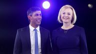 Conservative leadership candidates Liz Truss and Rishi Sunak stand together at the hustings event in London