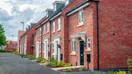 A row of newly built houses, built to a traditional brick design in the North of England.