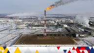 FILE PHOTO: A flame burns from a tower at Vankorskoye oil field owned by Rosneft company north of the Russian Siberian city of Krasnoyarsk March 25, 2015. REUTERS/Sergei Karpukhin/File Photo
