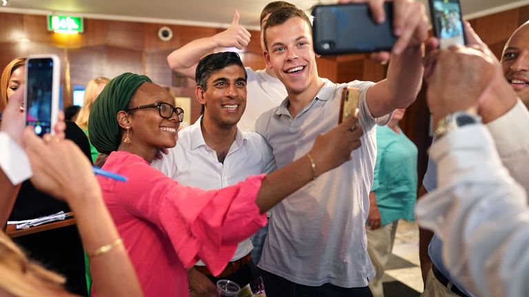 Rishi Sunak posing for a selfie during a visit to St John's Wood Synagogue, north London, as part of the campaign to be leader of the Conservative Party