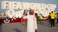 A man takes a selfie with a photograph with a sign reading in English" Fifa World Cup, Qatar 2022" at the corniche in Doha, Qatar
PIC:AP